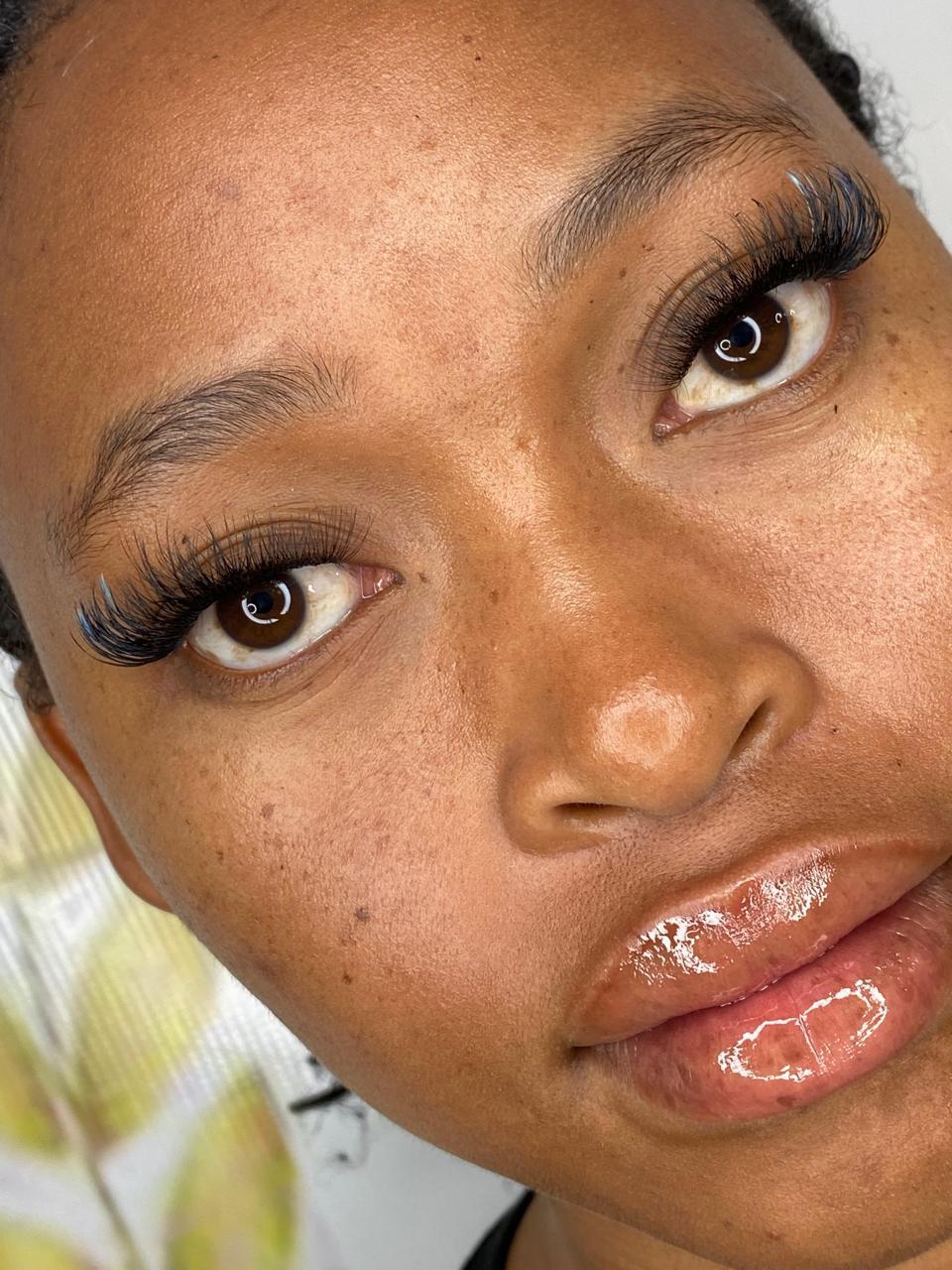Classic hybrid lash set — freckled skin close-up